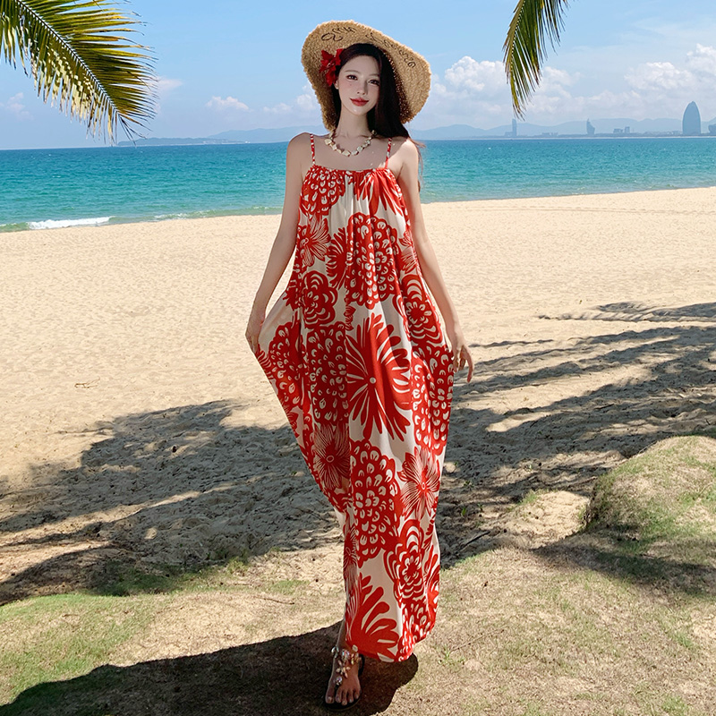 法式沙灘裙子海邊度假氣質橘色印花吊帶連衣裙女
