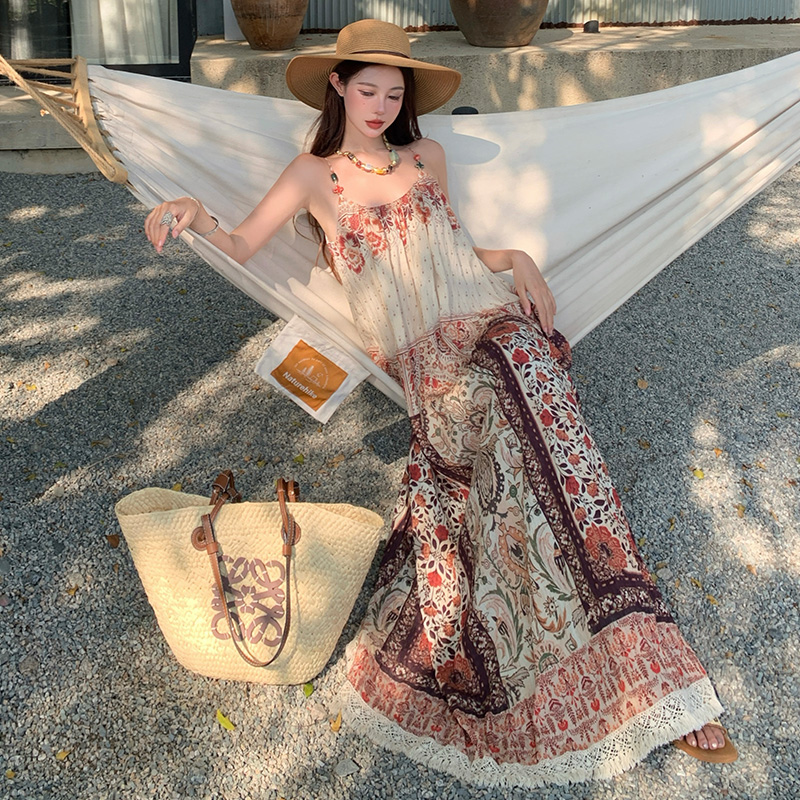 波西米亞壓褶吊帶裙女夏季民族風印花流蘇顯瘦度假連衣裙