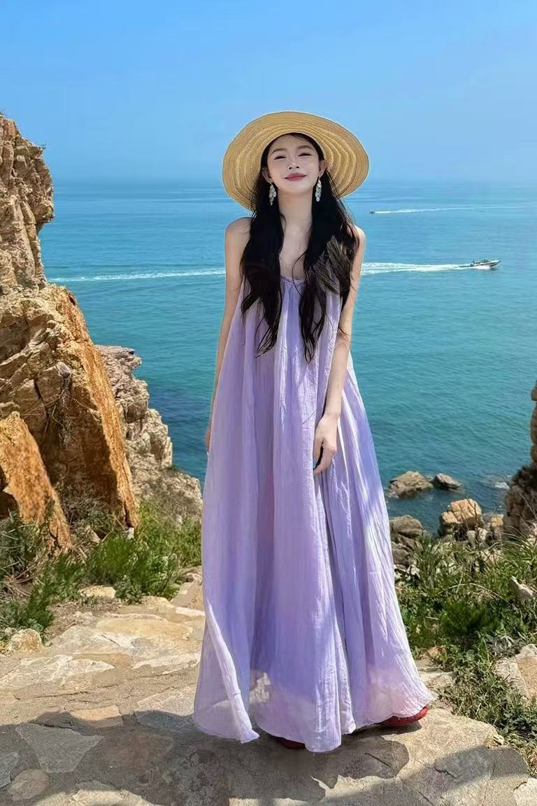 馬爾代夫海邊度假風紫色吊帶連衣裙女夏季性感露背寬松顯瘦長裙子