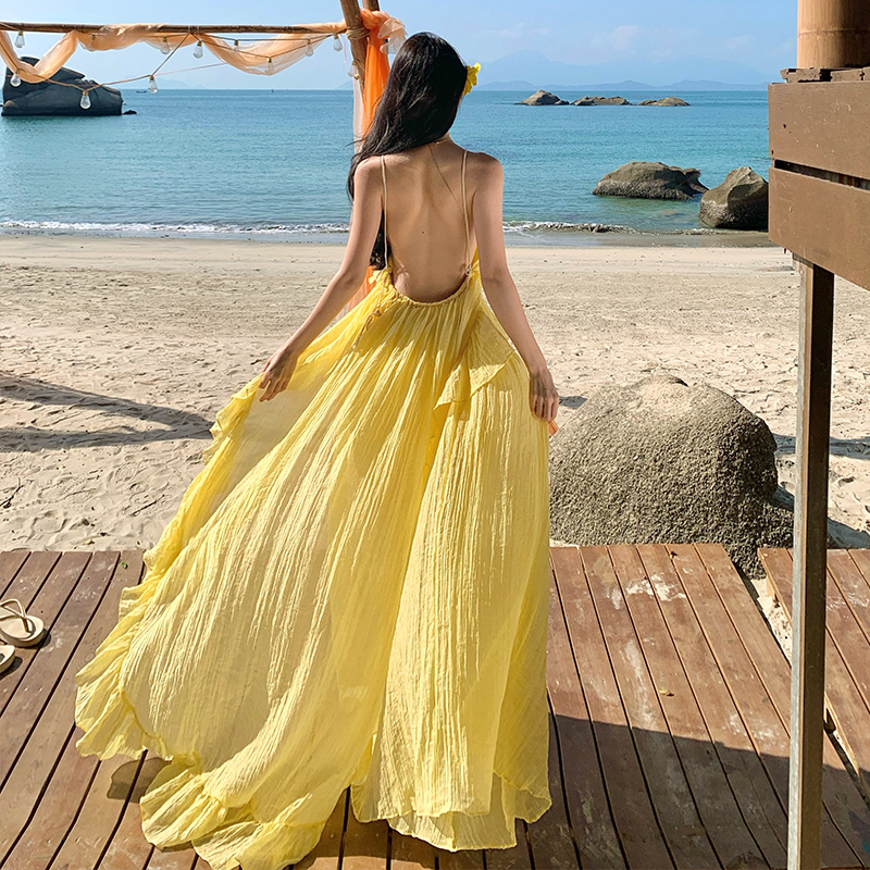三亞絕美拍照長裙海邊度假黃色大裙擺露背連衣裙性感沙灘裙氛圍感
