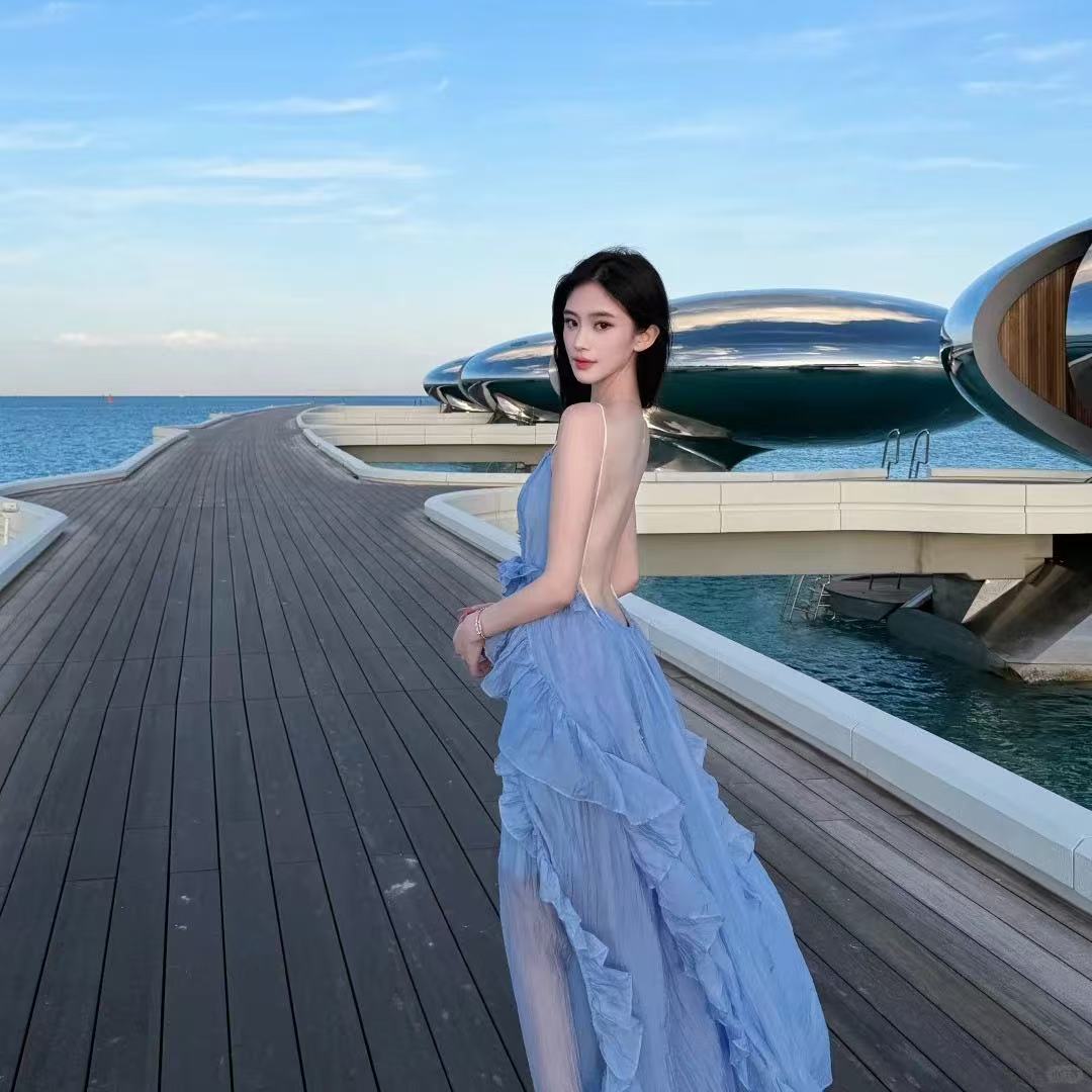 藍色溫柔風露背吊帶裙女夏季旅游穿搭長裙海邊度假連衣裙