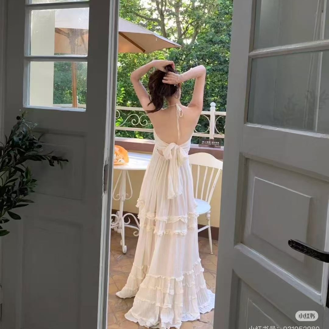法式性感純欲風泰國海邊度假連衣裙女三亞性感吊帶蛋糕露背長裙子
