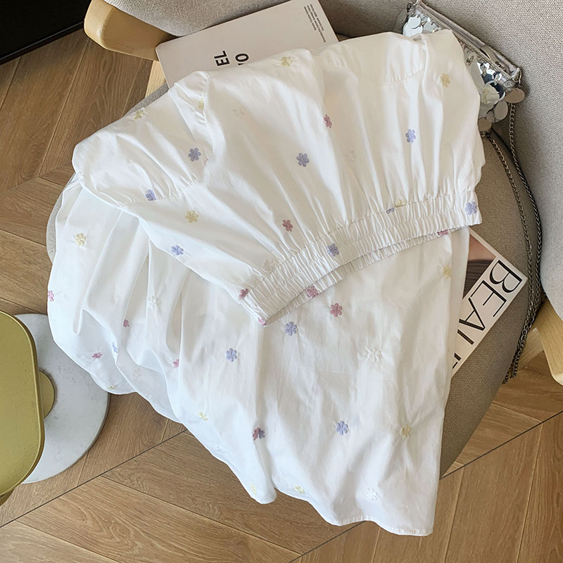 白色刺繡碎花半身裙子女2026新款高腰夏季法式獨特a字傘裙中長裙