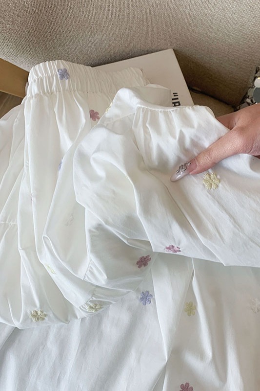 白色刺繡碎花半身裙子女2026新款高腰夏季法式獨特a字傘裙中長裙