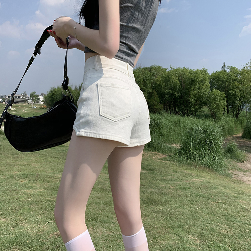 高腰牛仔短褲女夏季新款彈力緊身包臀不規則設計感兩粒扣辣妹熱褲