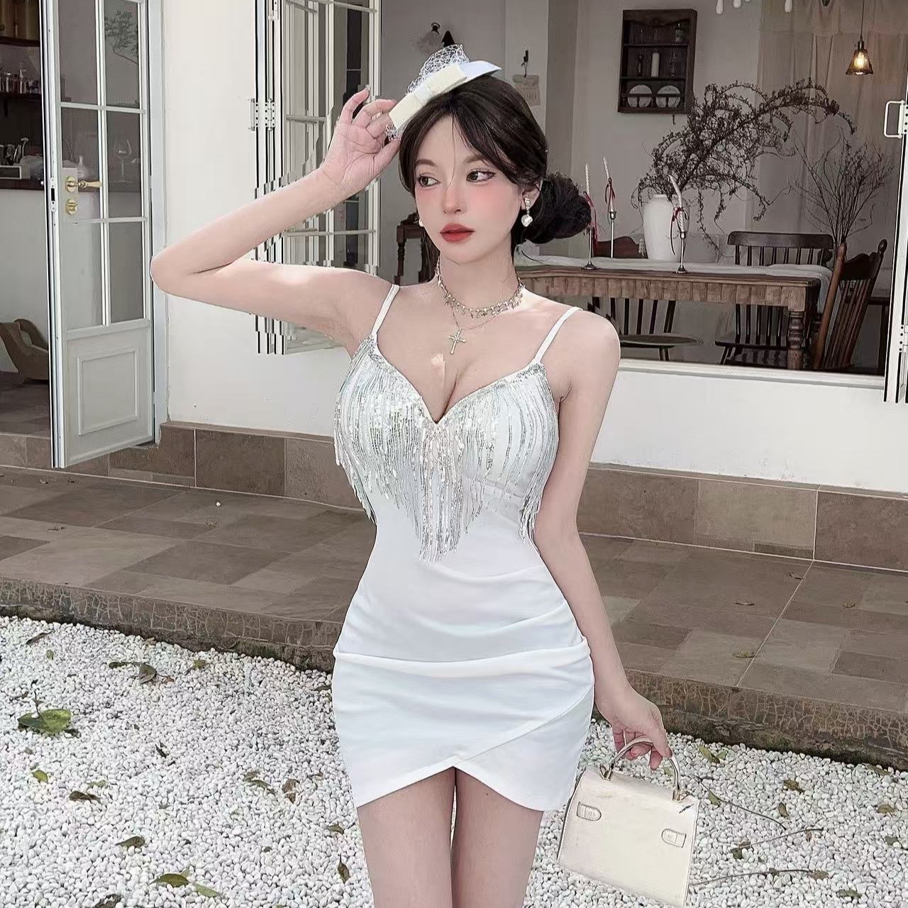 實拍低胸彈力流蘇拼接吊帶包臀短款打底連衣裙