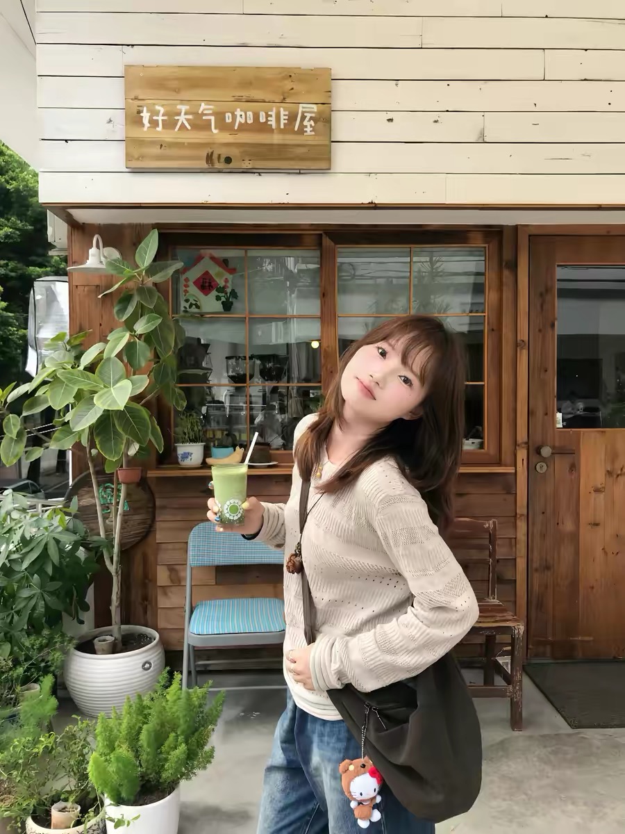 慵懶風燕麥杏鏤空提花羊毛罩衫秋季薄款顯瘦針織長袖T恤女