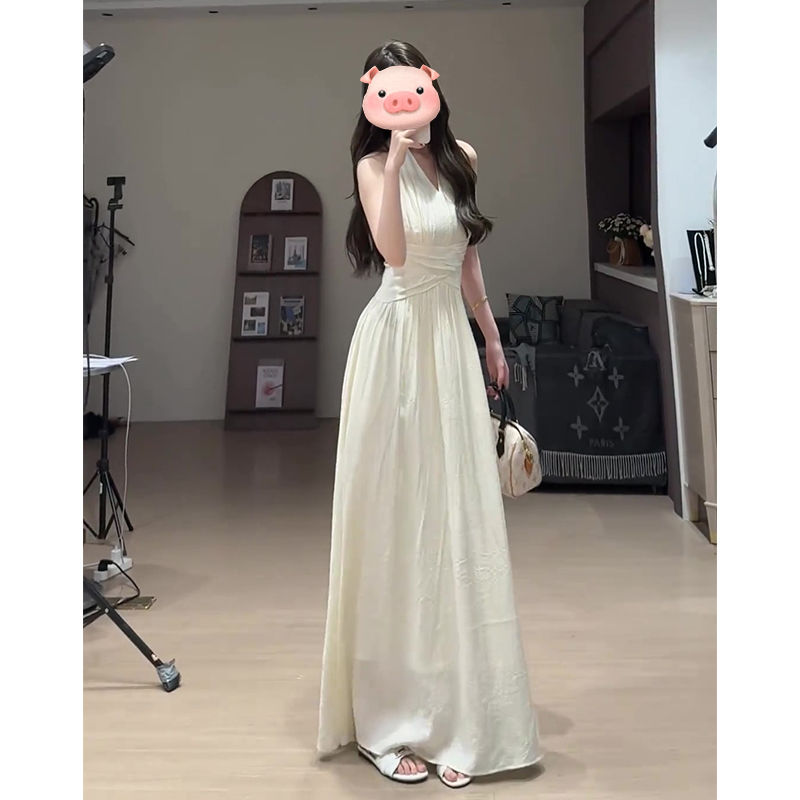 法式白色無袖掛脖v領連衣裙女2026夏季新款絕美收腰顯瘦大擺長裙