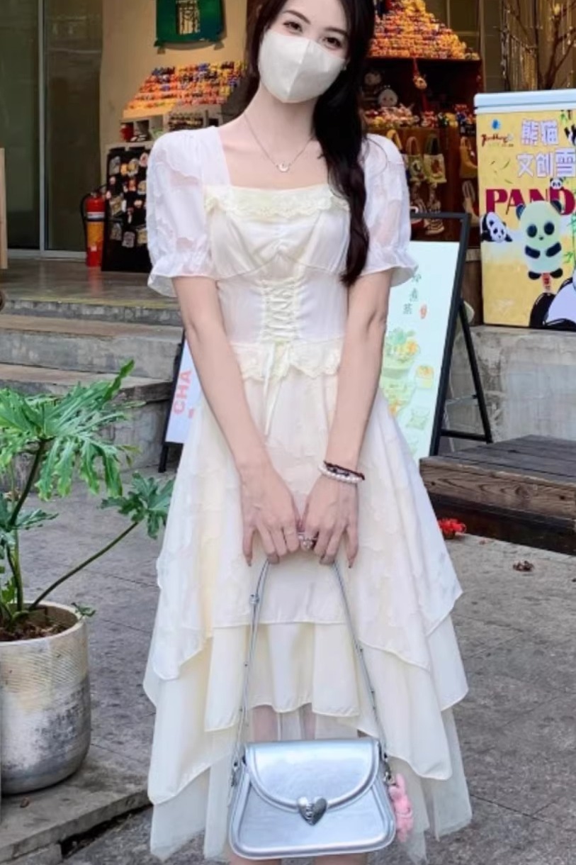 法式赫本風杏色連衣裙女夏季新款小個子甜美設計感小眾收腰長裙