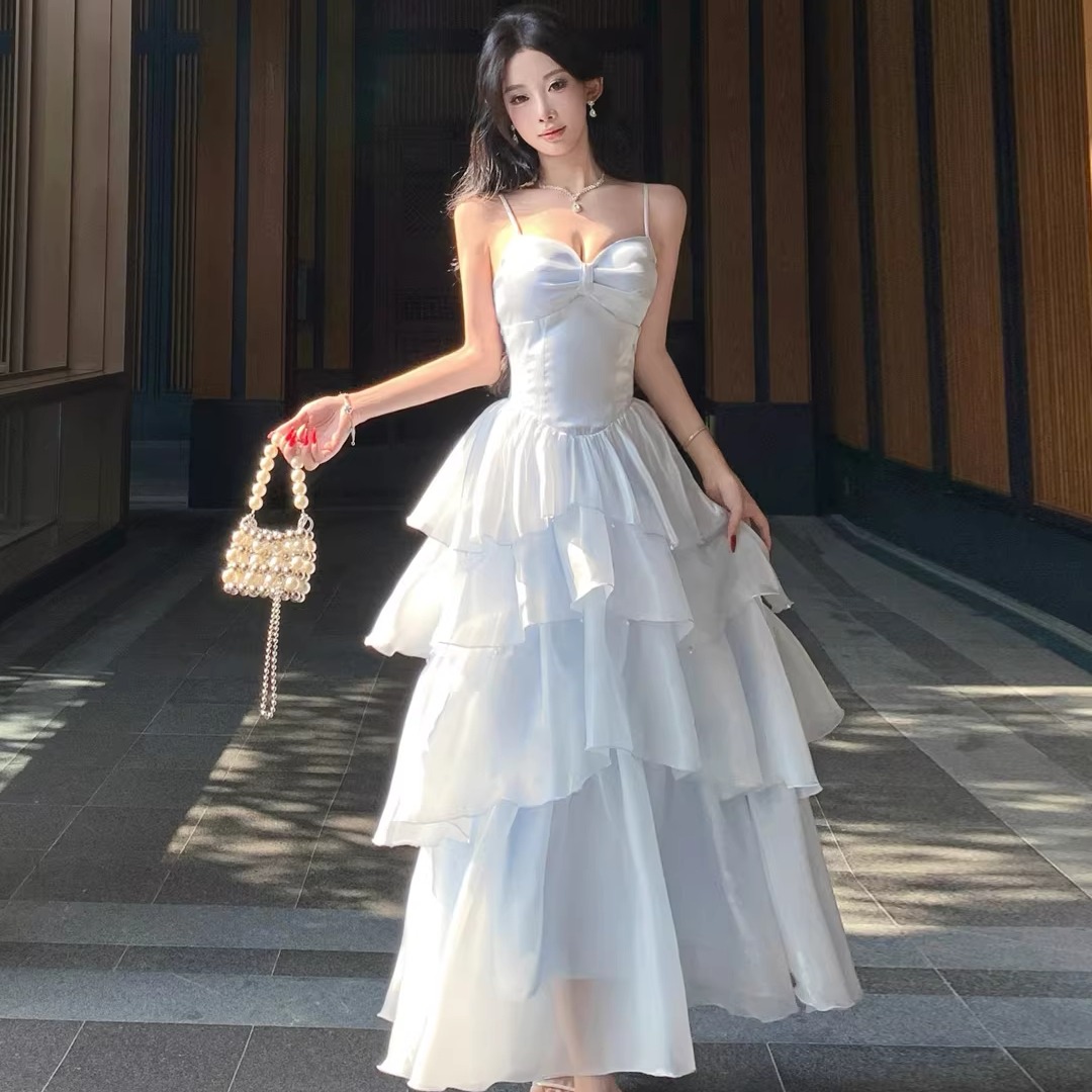 法式藍色光澤感吊帶蛋糕連衣裙女生日禮服裙收腰顯瘦海邊度假長裙