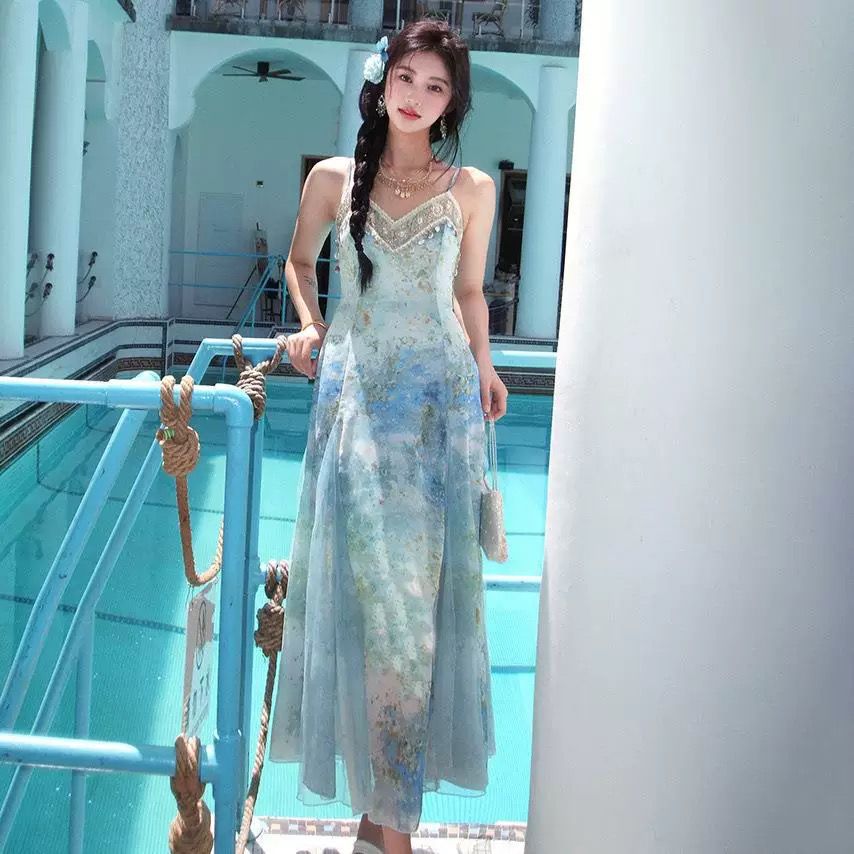 藍色暈染印花長裙花邊織帶連衣裙夏季溫柔氛圍氣質通勤拼接吊帶裙
