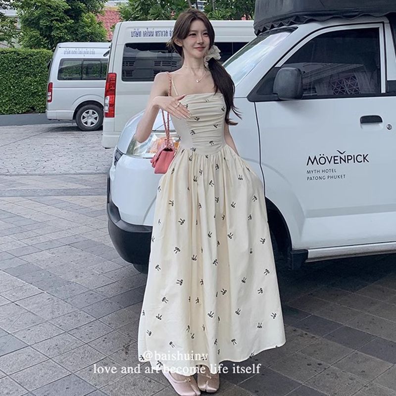 法式溫柔風蝴蝶結印花吊帶連衣裙女夏季高級感氣質收腰顯瘦初戀裙