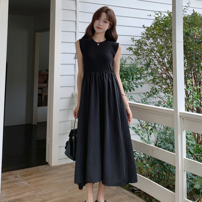 赫本風茶歇法式黑色吊帶背心連衣裙女2026新款夏季氣質長裙