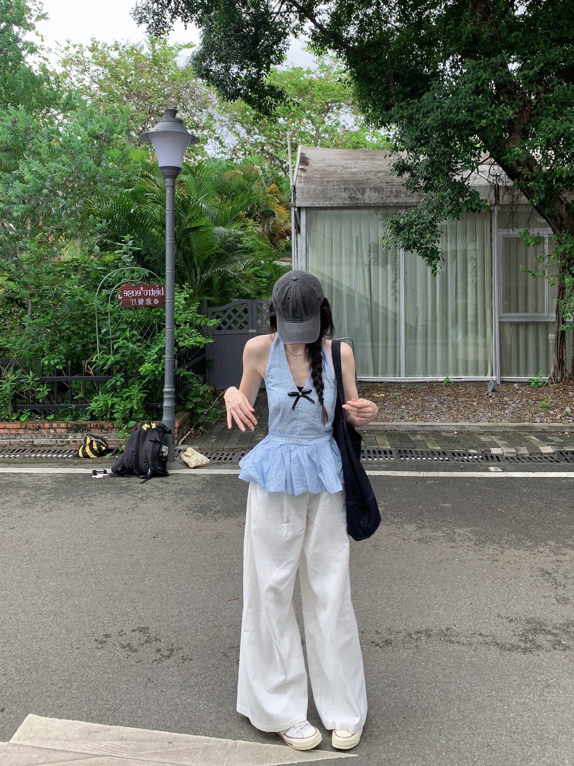 2026蝴蝶結露背氣質藍色波點掛脖吊帶背心夏季無袖花苞下擺上衣女