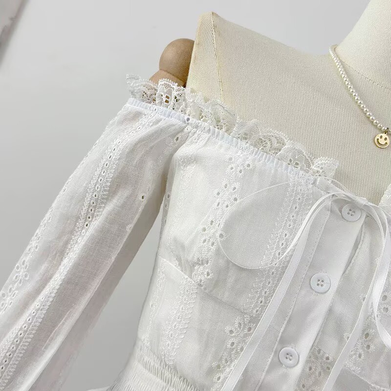 韓系木耳邊一字肩刺繡鏤空長袖襯衫女春2026蕾絲拼接收腰顯瘦上衣