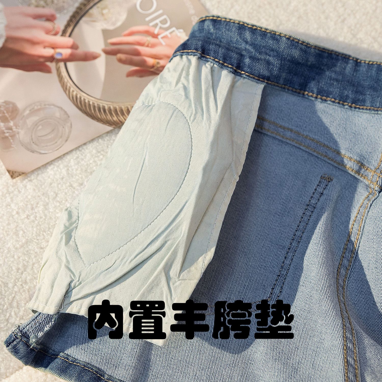 圓弧形設計感顯腿長彈力緊身內置豐胯墊牛仔短褲2026年夏季熱褲女