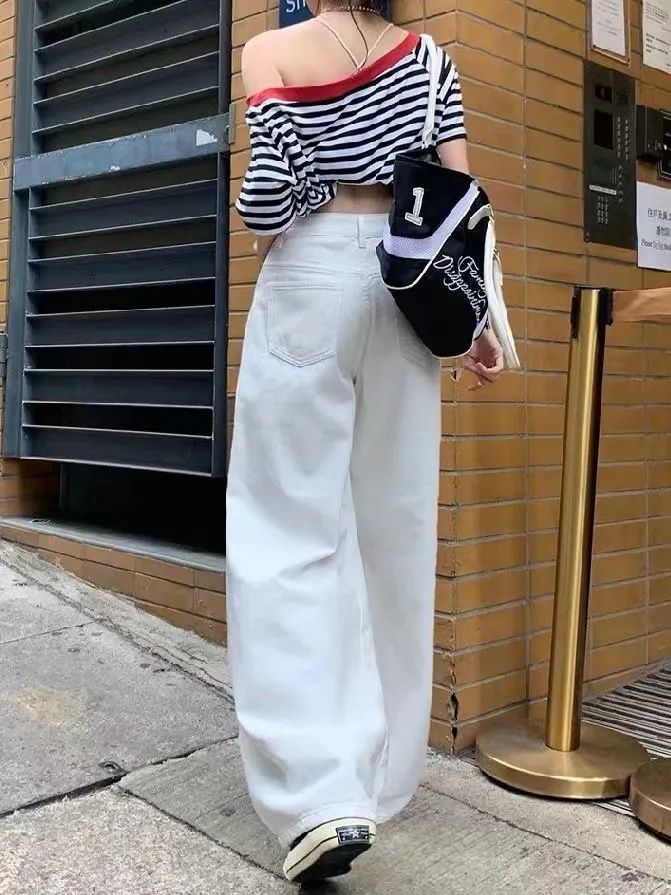 白色闊腿鐮刀牛仔褲女夏季新款高腰寬松顯瘦設計感百搭拖地彎刀褲