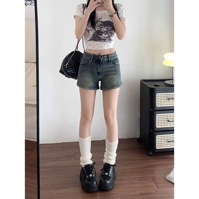 美式復古辣妹牛仔短褲女夏新款中高腰彈力顯瘦設計感a字包臀熱褲