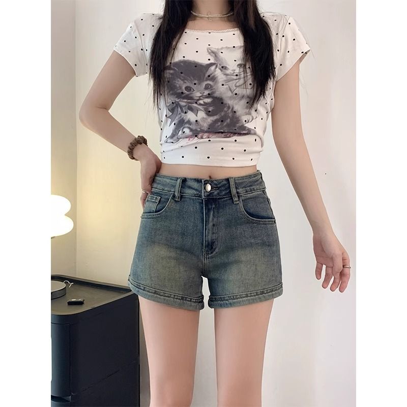 美式復古辣妹牛仔短褲女夏新款中高腰彈力顯瘦設計感a字包臀熱褲