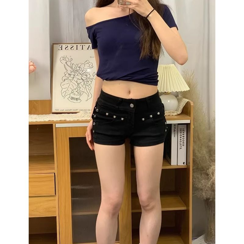 美式辣妹黑色鉚釘設計低腰牛仔短褲超短褲女夏季顯瘦a字新款熱褲