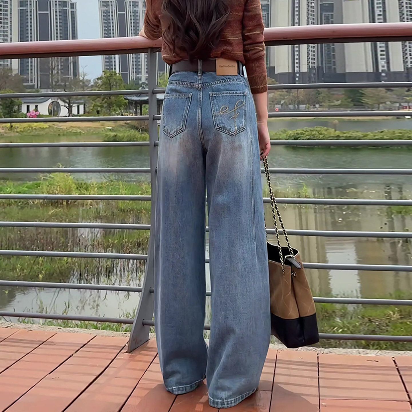 藍色版型好的彎刀牛仔褲女2026春季新款小個子高腰顯瘦闊腿褲子春