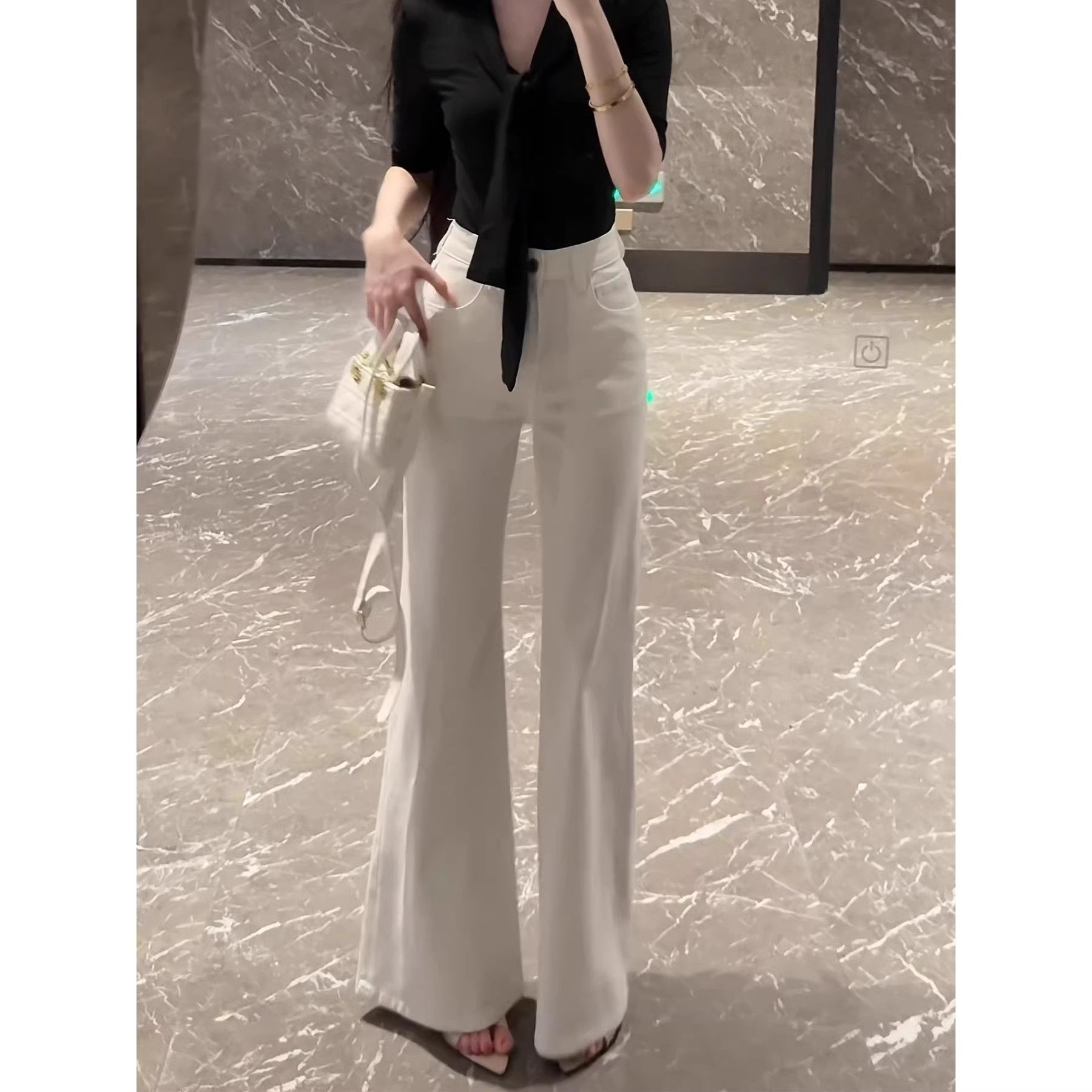 白色美式不貼腿微喇牛仔褲女2026新款春夏季辣妹寬松顯瘦喇叭長褲
