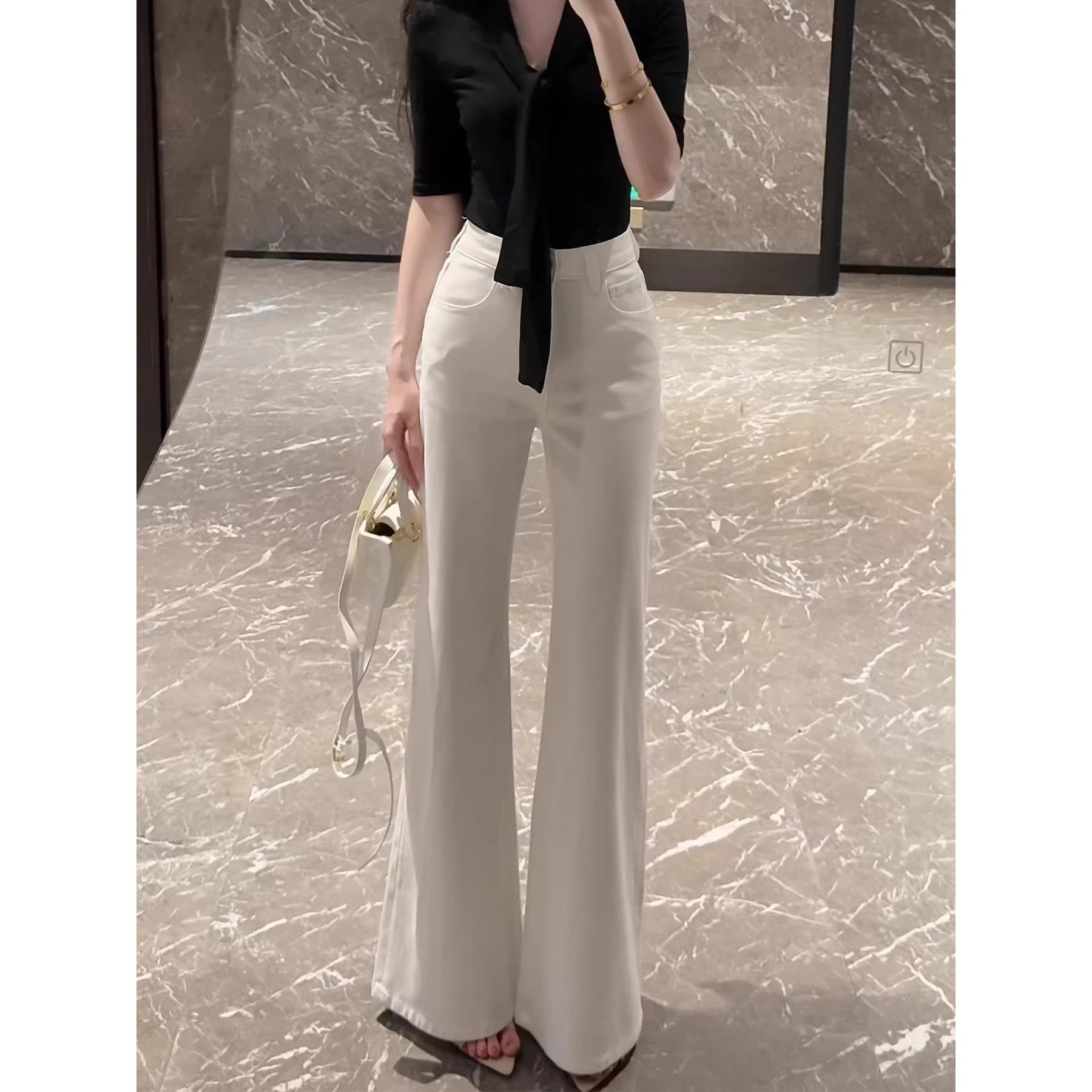 白色美式不貼腿微喇牛仔褲女2026新款春夏季辣妹寬松顯瘦喇叭長褲