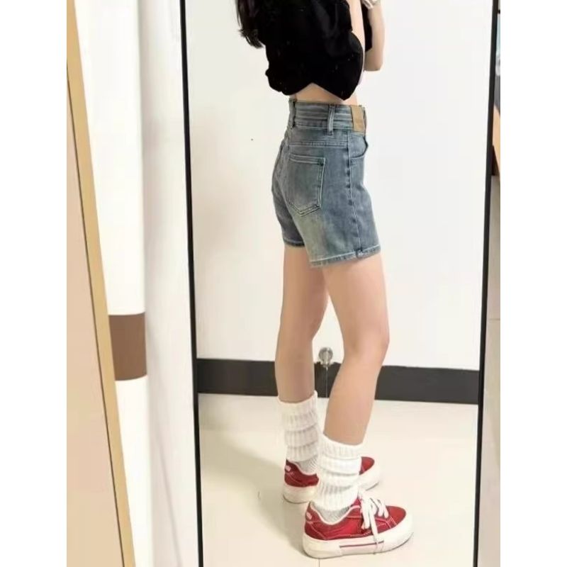 韓版藍色設計感雙扣高腰不露牛仔短褲女2026新款夏季包臀三分熱褲