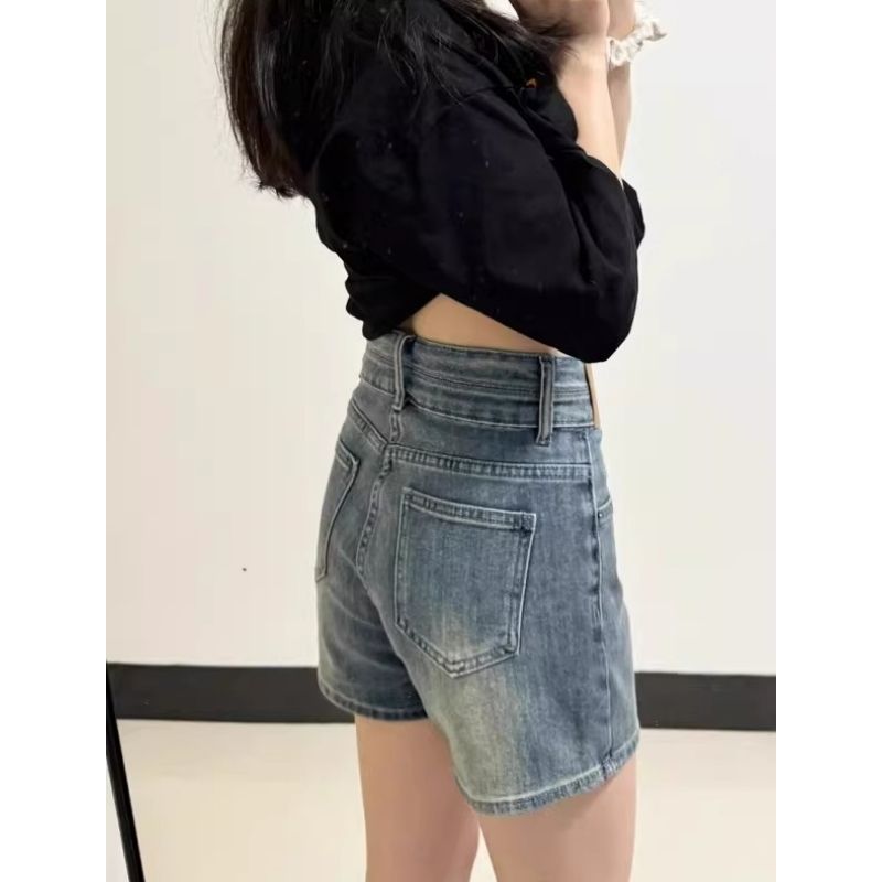 韓版藍色設計感雙扣高腰不露牛仔短褲女2026新款夏季包臀三分熱褲
