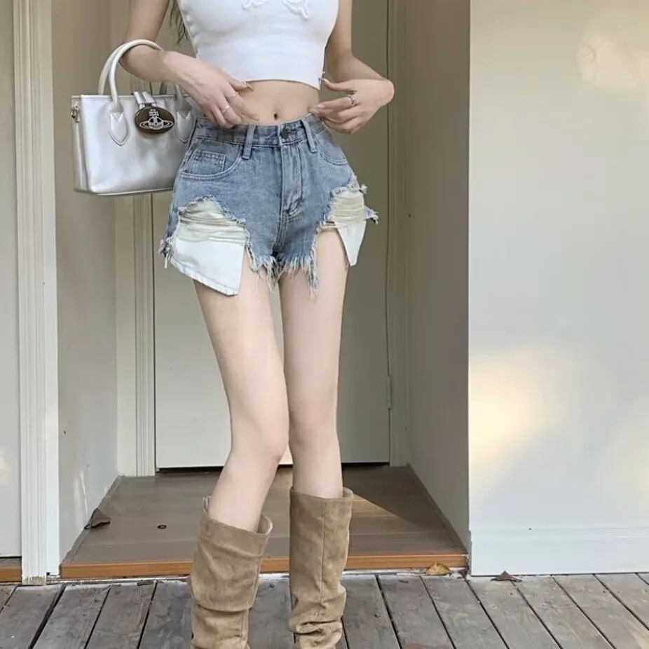 低腰辣妹破洞牛仔短褲夏季新款美式歐美復古口袋顯瘦流蘇毛邊熱褲