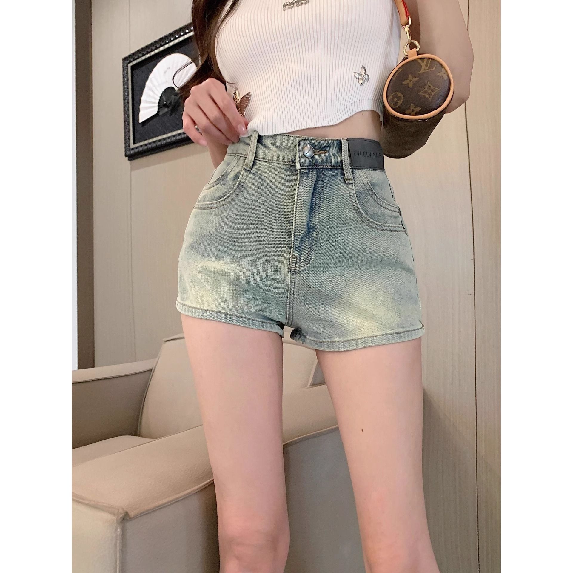 時尚休閑2026年修身顯瘦牛仔彈力包臀短褲女夏季美式皮牌裝飾直筒