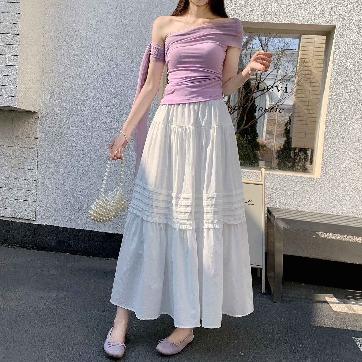 設計感壓褶a字木耳邊半身裙女春夏2026新款休閑好看大擺蛋糕裙子