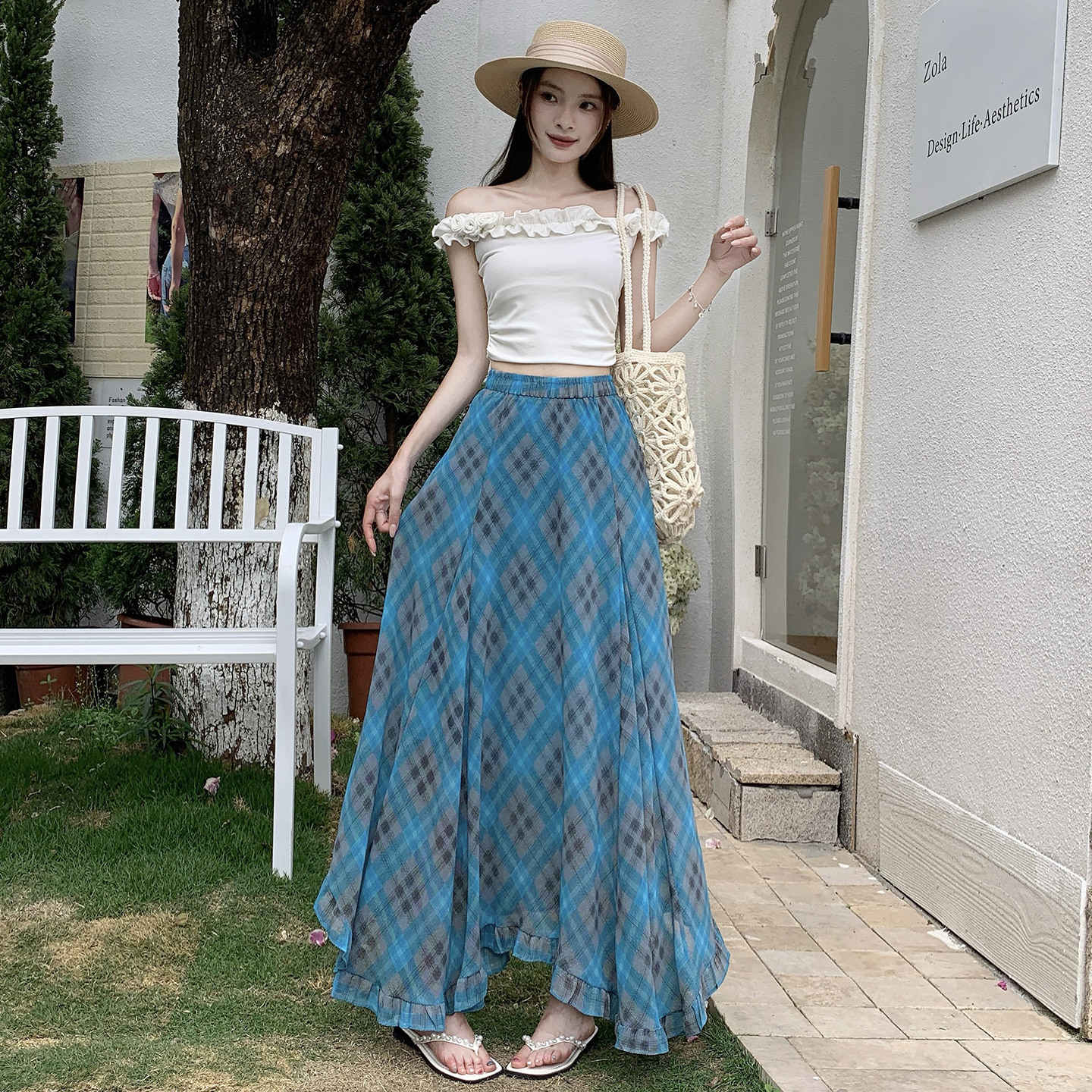 復古格紋不規則半身裙女2026夏季薄款高腰遮胯百搭大擺A字中長裙