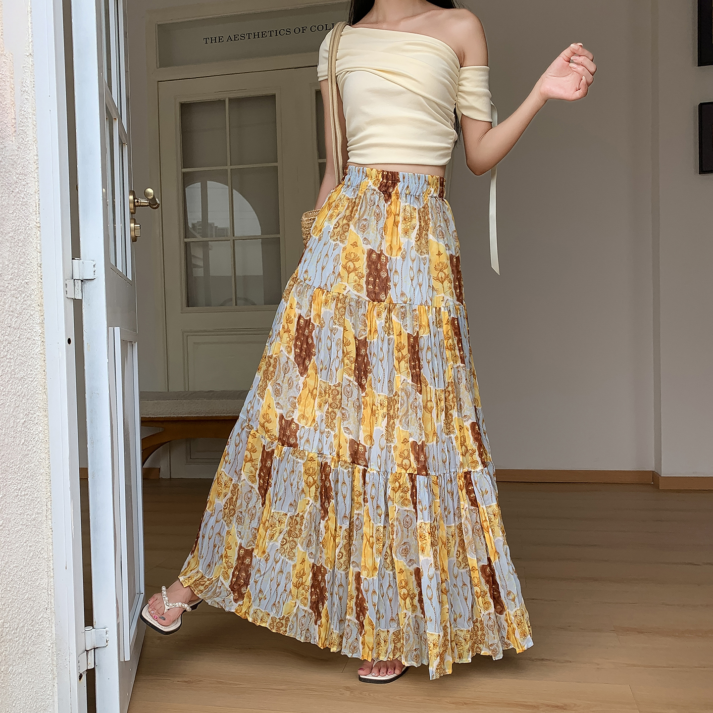 獨特別致度假風黃色碎花半身裙女2026夏季高腰顯瘦飄逸氣質大擺裙
