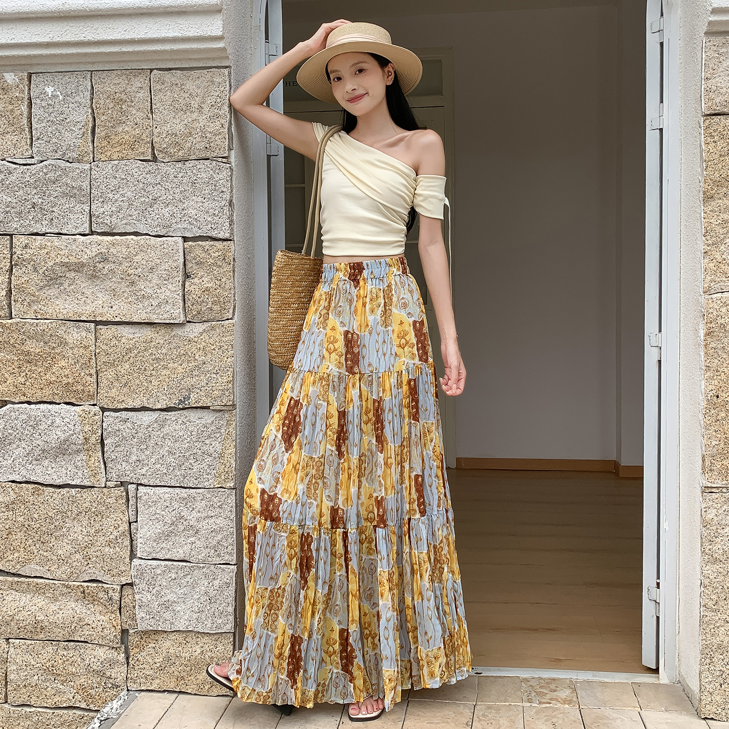 油畫風碎花半身裙女2026夏季新款法式松緊腰褶皺顯瘦A字中長裙子
