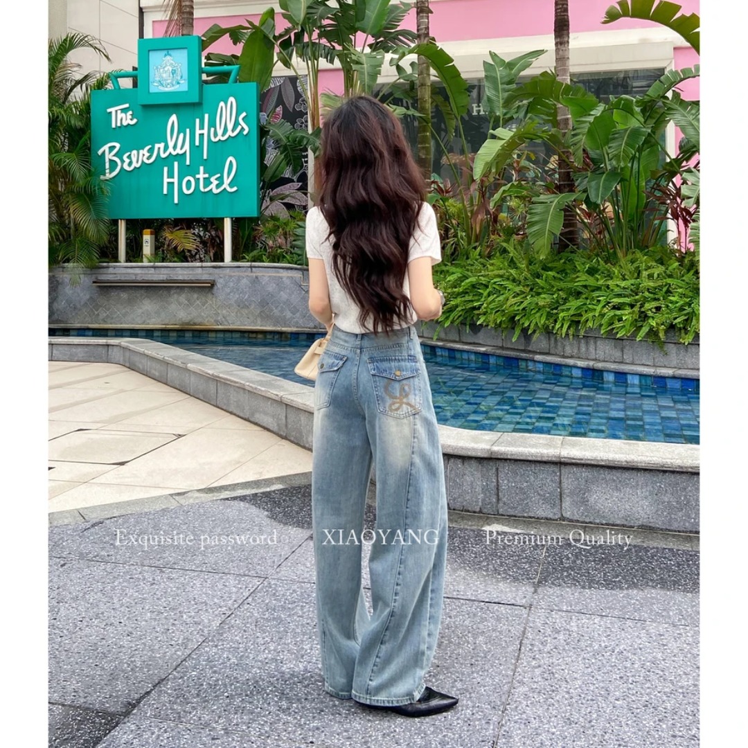 夏季小個子彎刀闊腿牛仔褲女款刺繡口袋中高腰顯瘦設計感2026新款