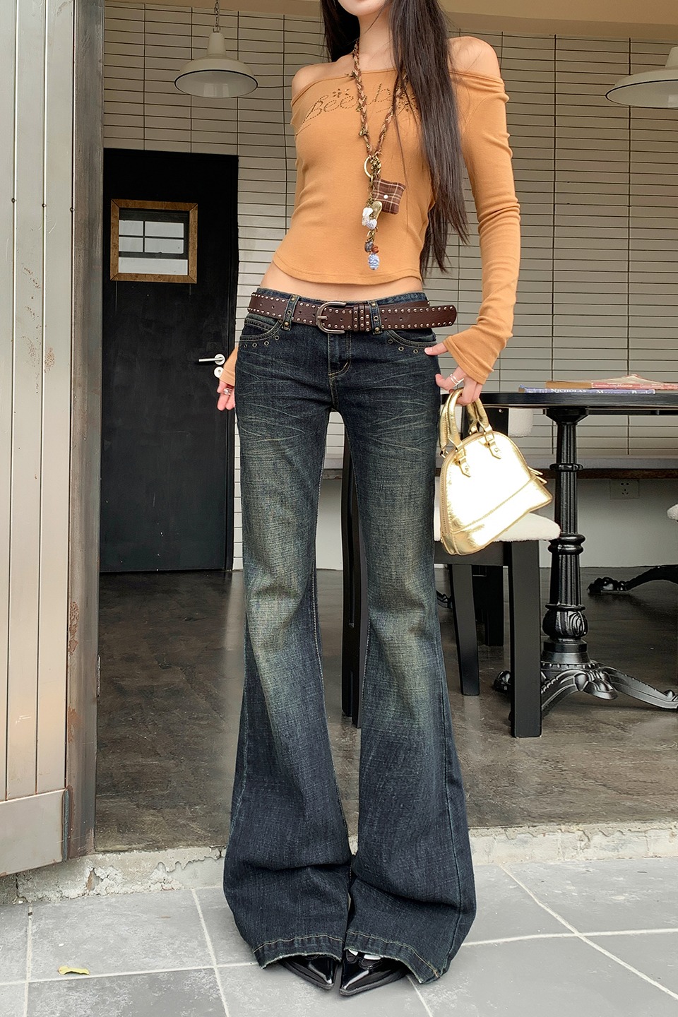美式復古辣妹低腰微喇牛仔褲女秋冬季柳釘設計修身顯瘦小眾喇叭褲