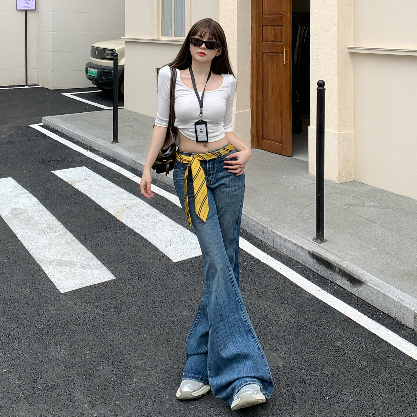 美式辣妹低腰牛仔褲女2026春季新款竹節紋深藍色直筒拖地喇叭褲子