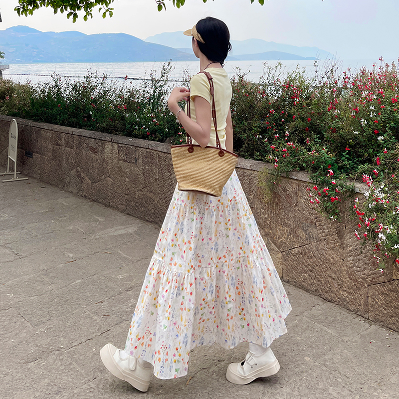 韓系碎花半身裙女2026春夏新款百搭A字高腰顯瘦設計感蛋糕中長裙