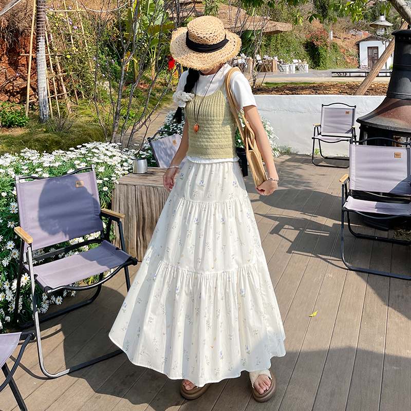 森系溫柔碎花半身裙女2026春霞新款松緊腰顯瘦氣質中長款傘裙