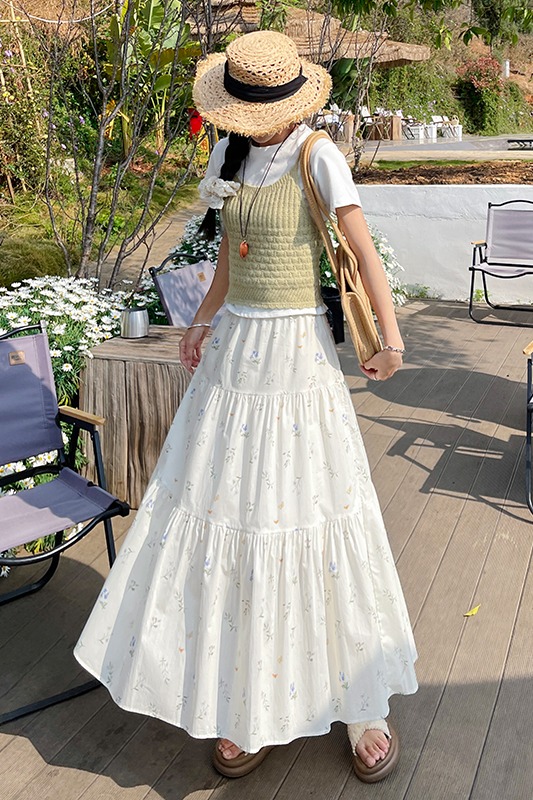 森系溫柔碎花半身裙女2026春霞新款松緊腰顯瘦氣質中長款傘裙