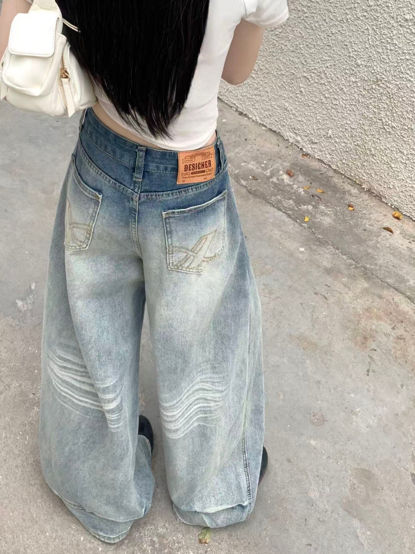 美式復古辣妹彎刀牛仔高街設計感寬松顯瘦垂感闊腿褲