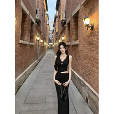 批发实拍春夏黑色性感无袖V领蕾丝拼接心结镂空露腰<b class='q'>包臀</b>长款<b class='q'>连衣裙</b>