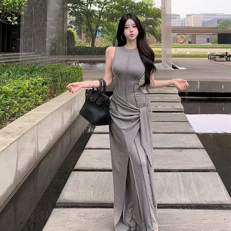 프랑스식 휴가 바람 페이크 레이어드 민소매 여성 드레스 ins 디자인 센스 허리 수축 슬림해 보이는 타이트 스커트 롱 스커트