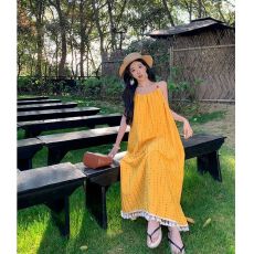 批发慵懒松弛感黄色流苏吊带显白<b class='q'>连衣裙</b>海边度假气质长裙绝美沙滩裙夏