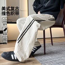 实拍秋冬新品美式复古运动针织裤条纹拼接休闲男女宽松直筒长裤