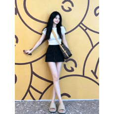批发甜辣风抽绳休闲<b class='q'>运动</b>黑色半身裙女辣妹包臀裙高腰<b class='q'>修身</b>显瘦A字短裙