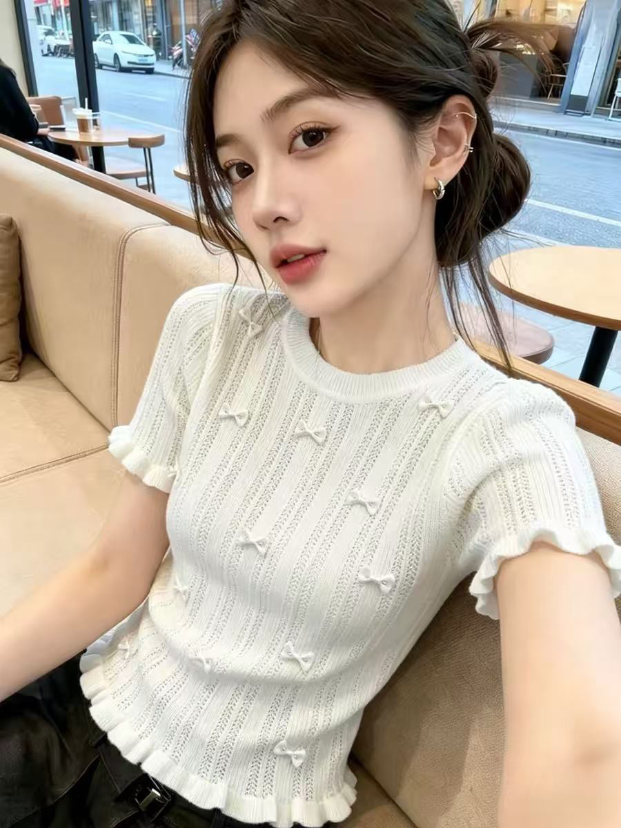 프랑스식 달콤한 매운맛 나비 매듭 홀로우 아웃 Chic 반팔 니트 스웨터 여성 2026 여름 새로운 몸매 가꾸기 프릴 맨위