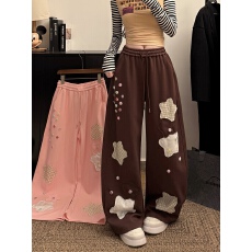 批发实拍多巴胺五角星贴布卫裤女亚萌感纽扣设计显瘦弯刀裤慵懒休闲裤