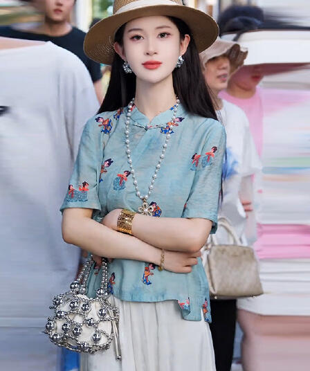새로운 중식 국풍 여성 셔츠 여름 2026 새로운 반팔 얇은 스타일 셔츠 빛 럭셔리 고급 센스 여성 의류 폭발 맨위